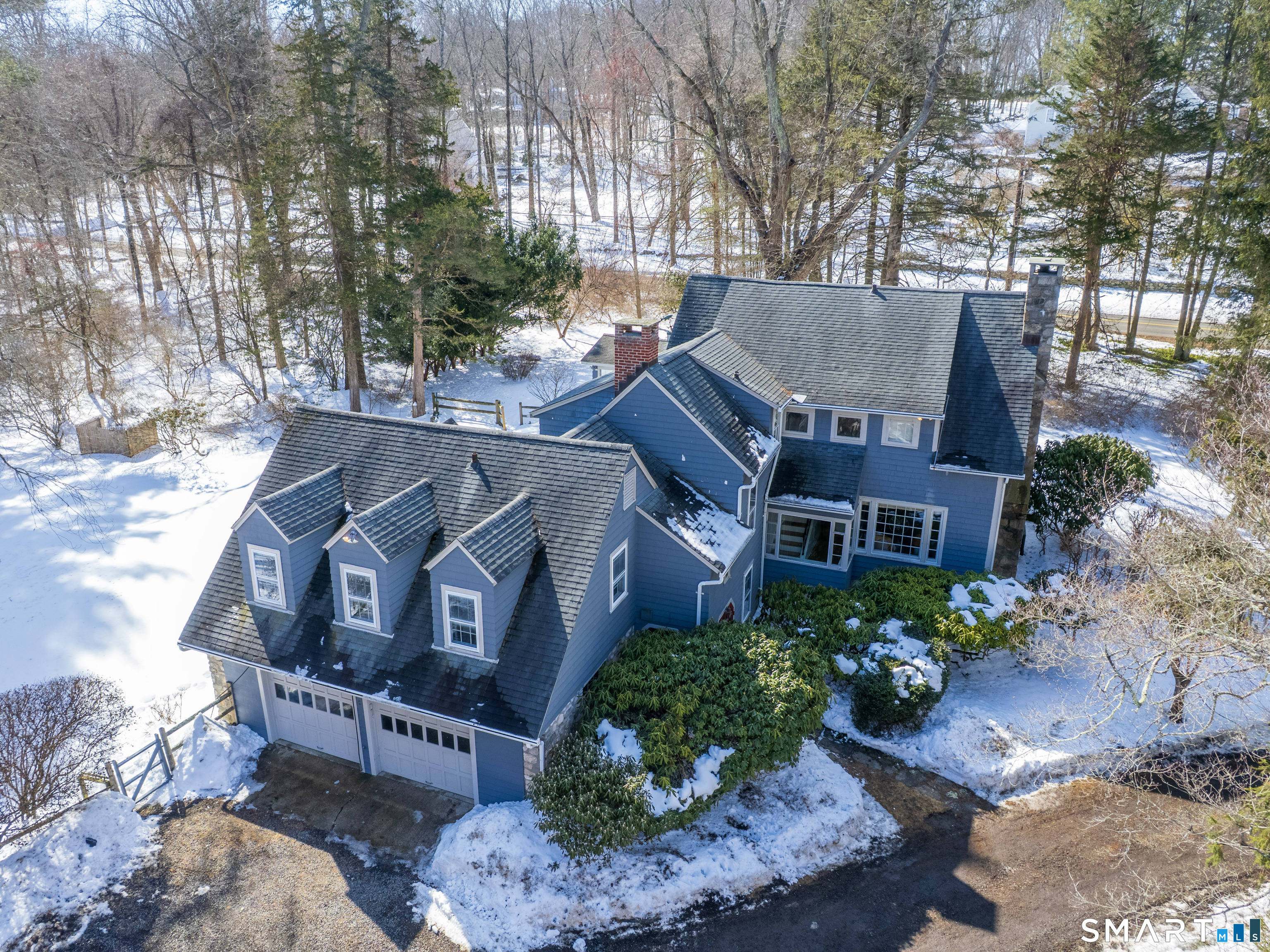340 Sturges Ridge Road Wilton, CT 06897 - Photo 2 of 40 a view of a house with a yard