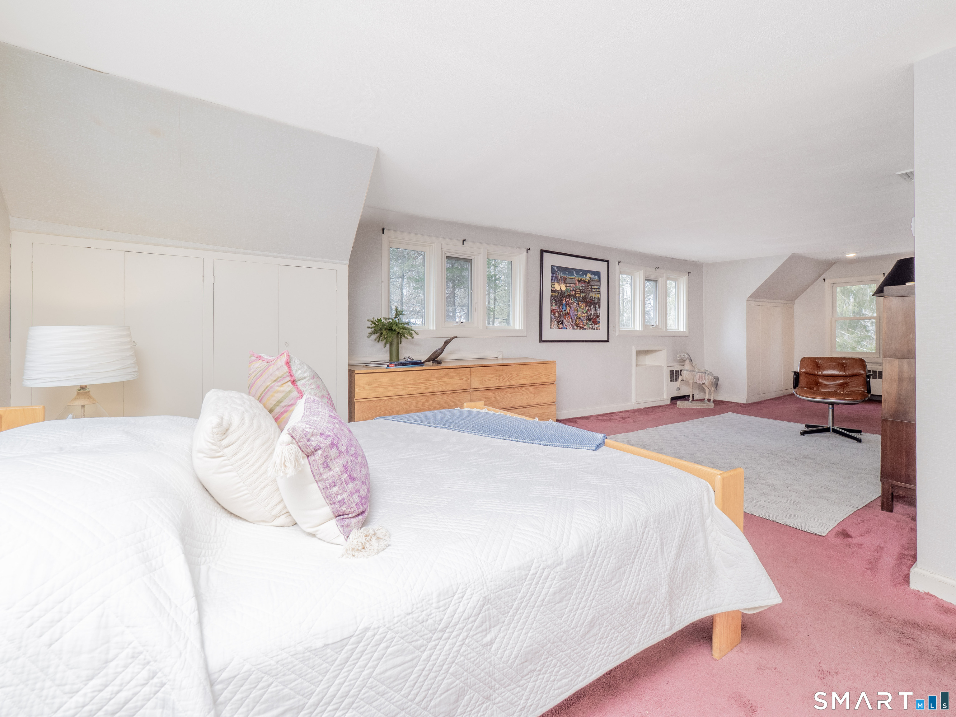 340 Sturges Ridge Road Wilton, CT 06897 - Photo 22 of 40 a bedroom with a bed and a couch