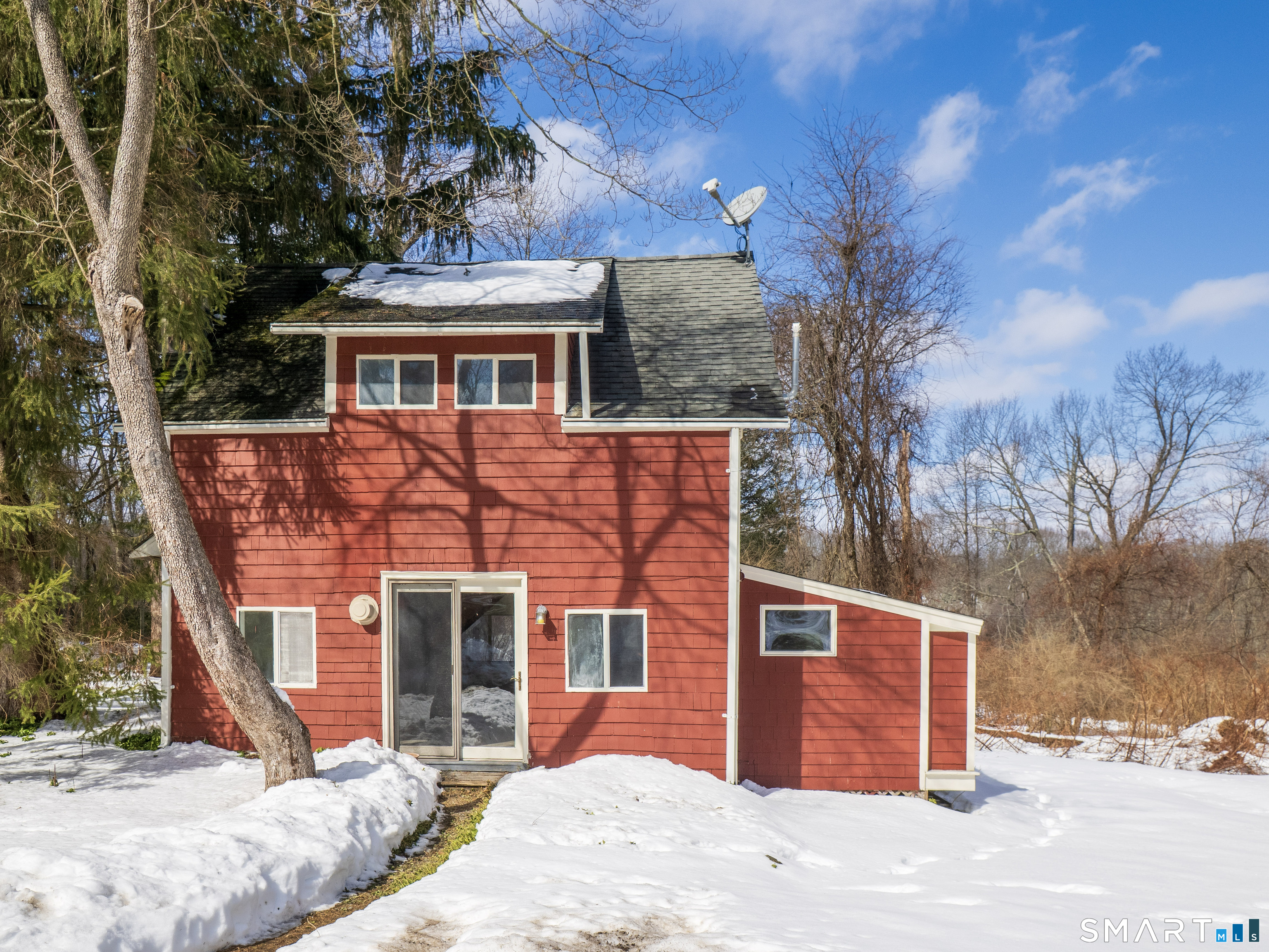340 Sturges Ridge Road Wilton, CT 06897 - Photo 30 of 40 a front view of a house with a yard