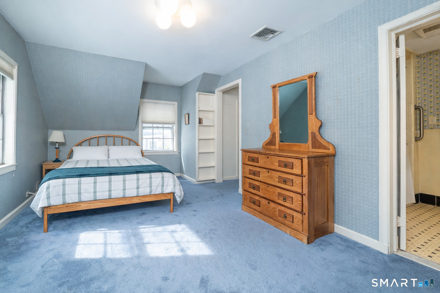 340 Sturges Ridge Road Wilton, CT 06897 - Photo 31 of 40 a bedroom with a bed and dresser