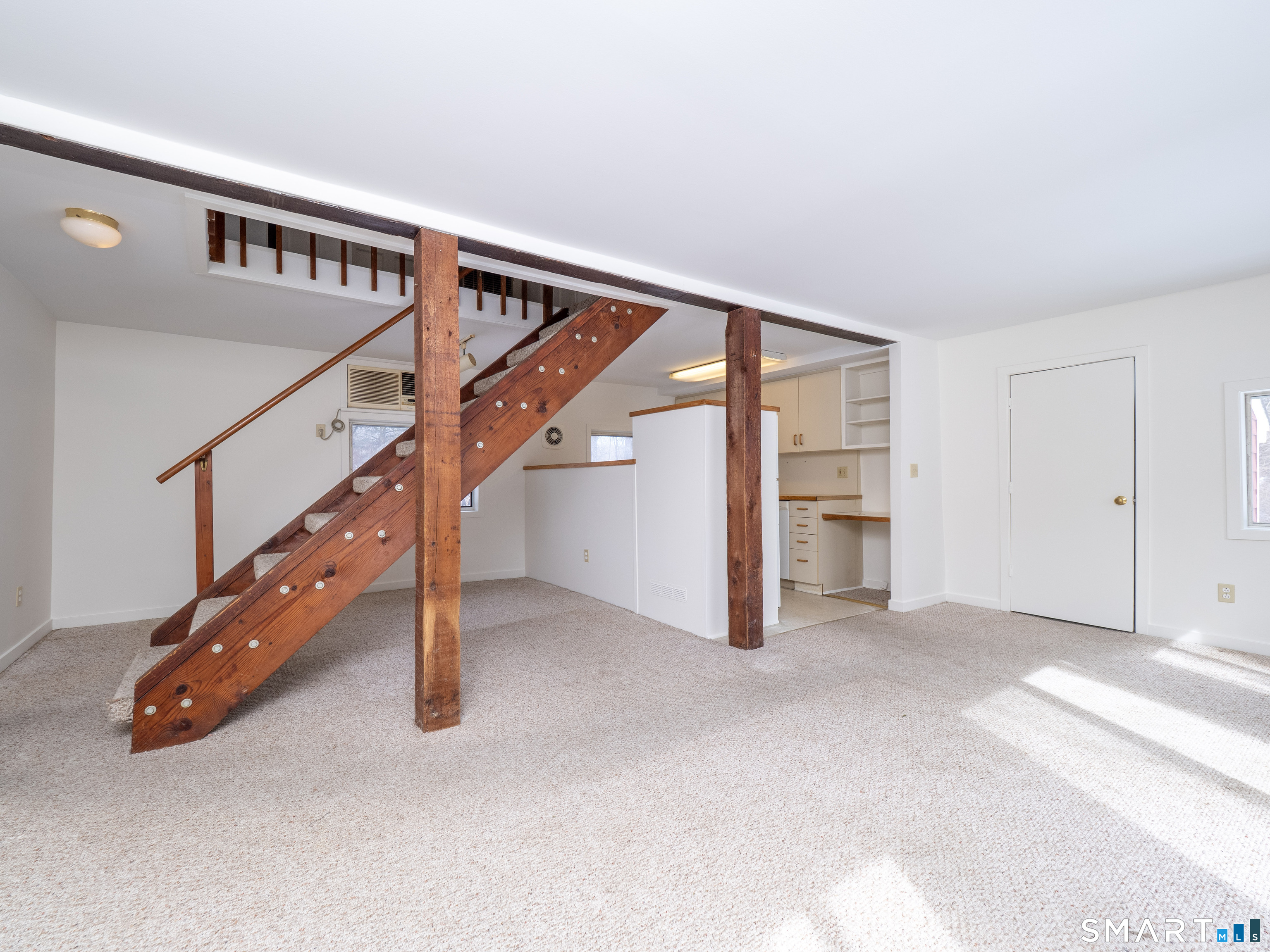 340 Sturges Ridge Road Wilton, CT 06897 - Photo 33 of 40 a view of an empty room with stairs