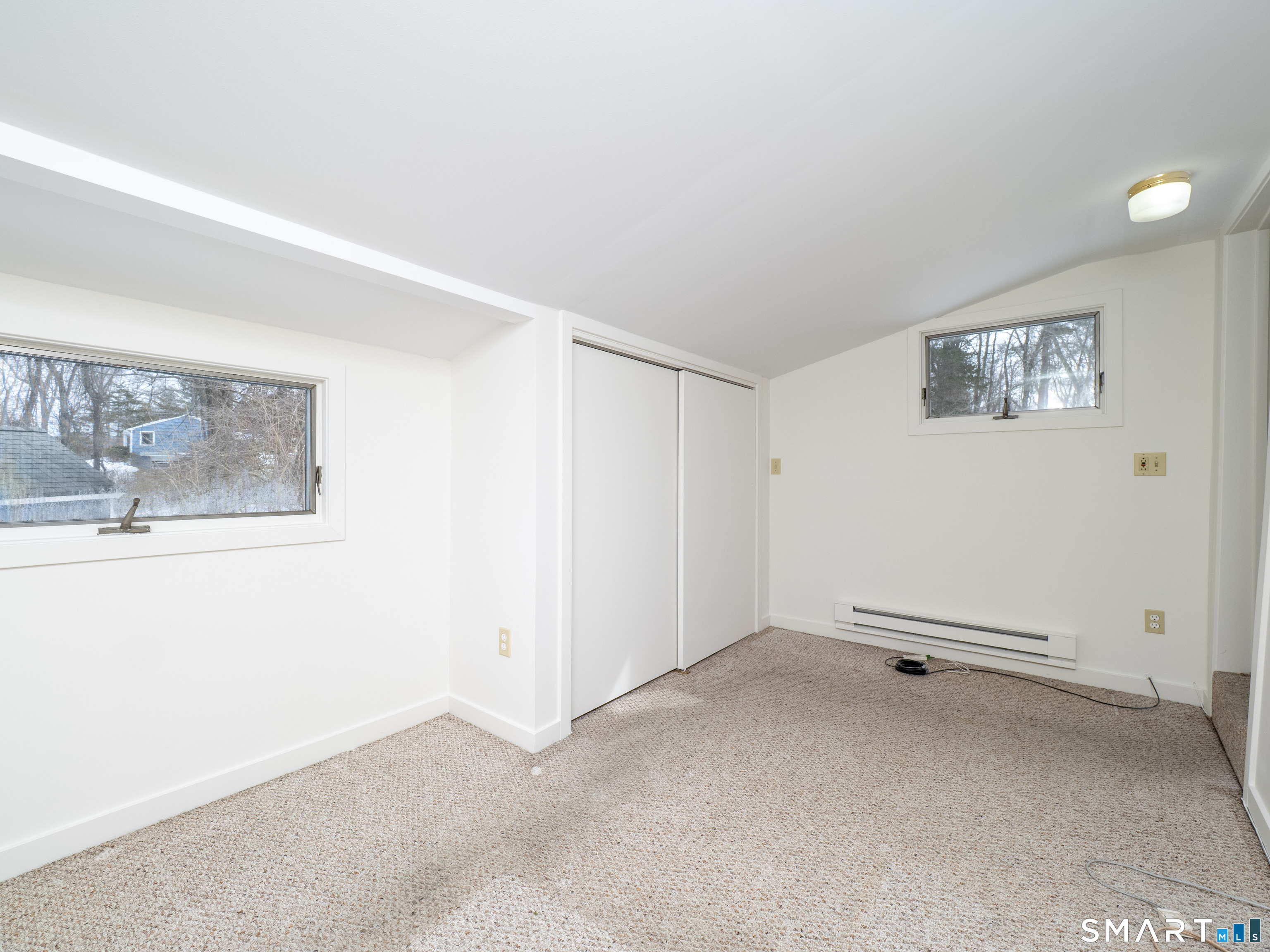 340 Sturges Ridge Road Wilton, CT 06897 - Photo 39 of 40 a view of an empty room with a window