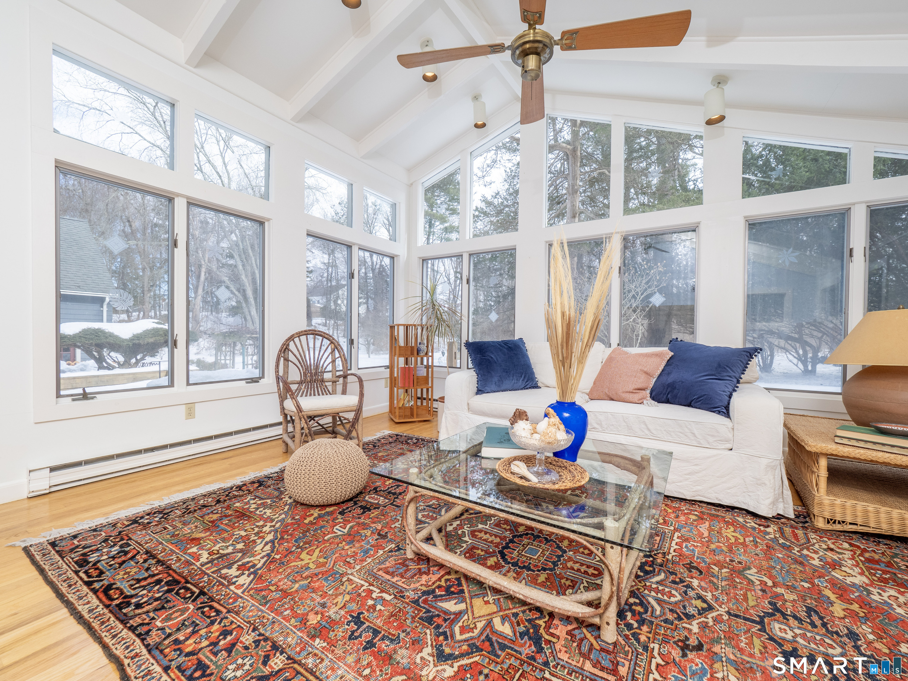 340 Sturges Ridge Road Wilton, CT 06897 - Photo 6 of 40 a living room with furniture and a rug