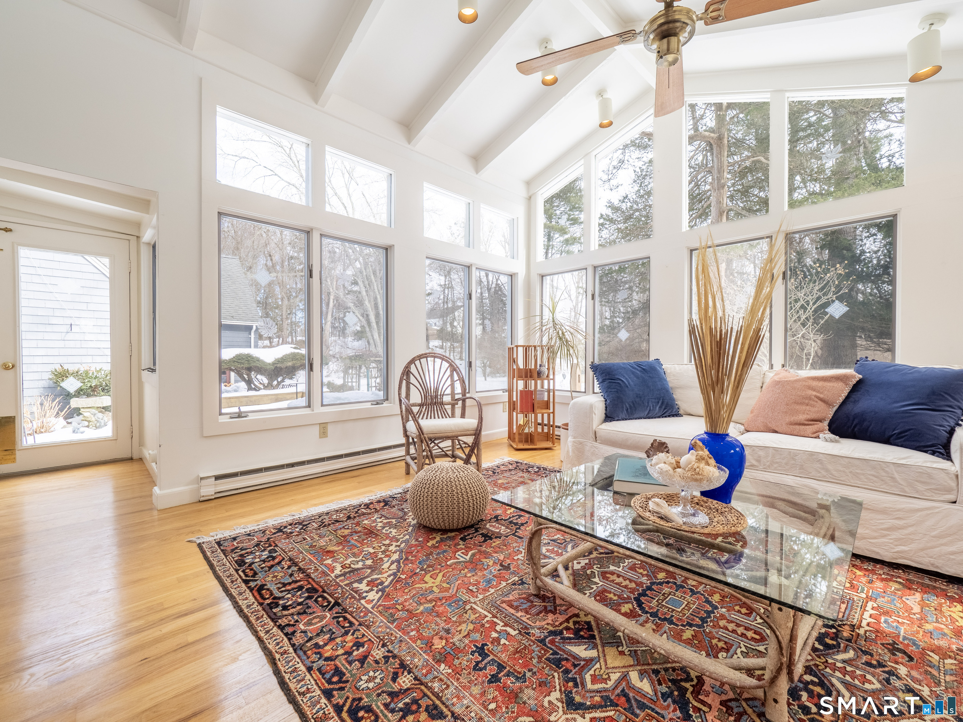 340 Sturges Ridge Road Wilton, CT 06897 - Photo 7 of 40 a living room with furniture and a table