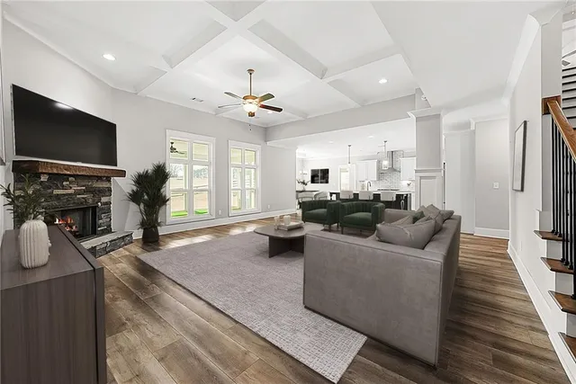 a view of entryway with stairs and wooden floor