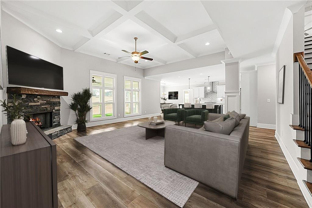 2519 Hog Liver Road Carrollton, GA 30117 - Photo 11 of 39 a living room with furniture and a flat screen tv