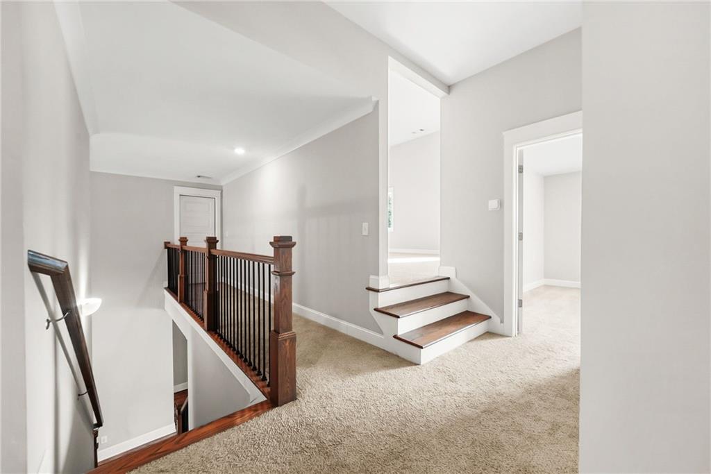 2519 Hog Liver Road Carrollton, GA 30117 - Photo 13 of 39 a view of entryway with stairs and wooden floor