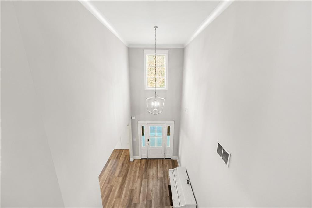 2519 Hog Liver Road Carrollton, GA 30117 - Photo 14 of 39 a view of a room with wooden floor and window