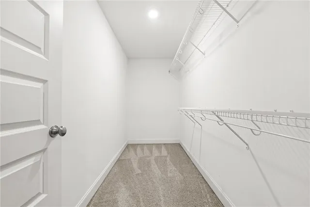 a view of a house with backyard porch and sitting area