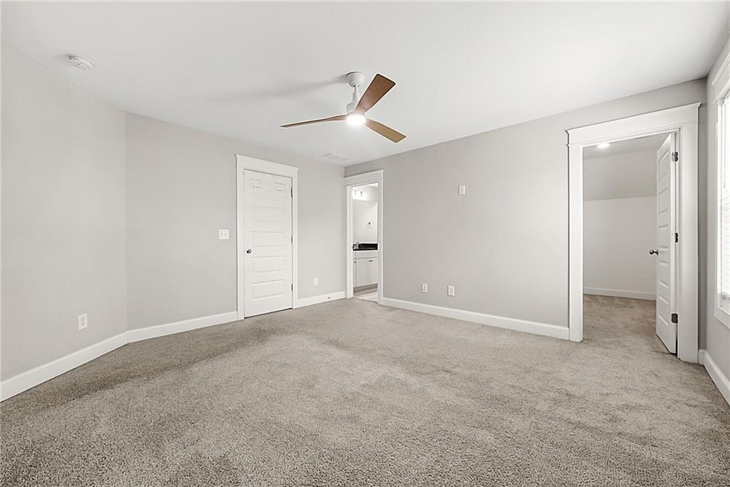 2519 Hog Liver Road Carrollton, GA 30117 - Photo 24 of 39 a view of an empty room with a ceiling fan