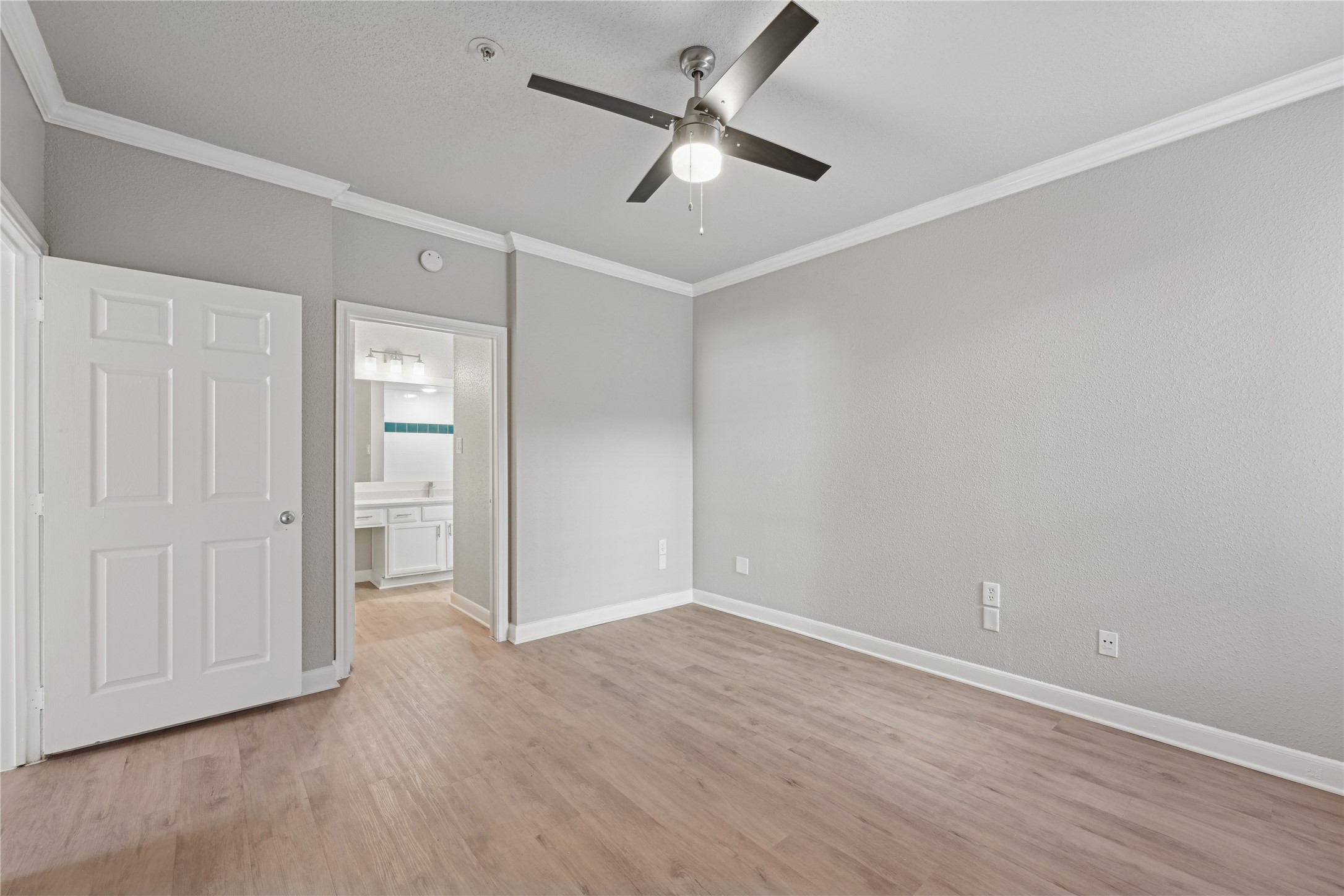 10990 West Road, Unit 203 Houston, TX 77064 - Photo 19 of 23 wooden floor in an empty room