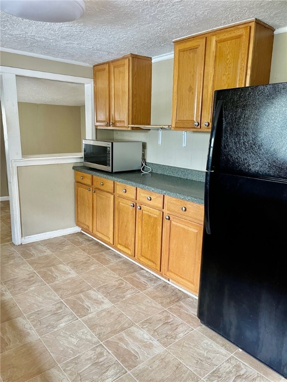 86114 Harry Green Road Yulee, FL 32097 - Photo 11 of 24 a kitchen with granite countertop a sink and a stove