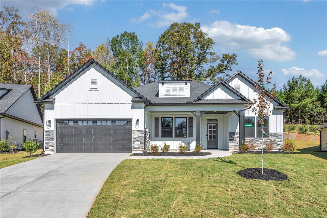 108 Shale Drive Central, SC 29630 - Photo 1 of 1 This newly constructed residence presents a striking facade with contemporary architectural elements.