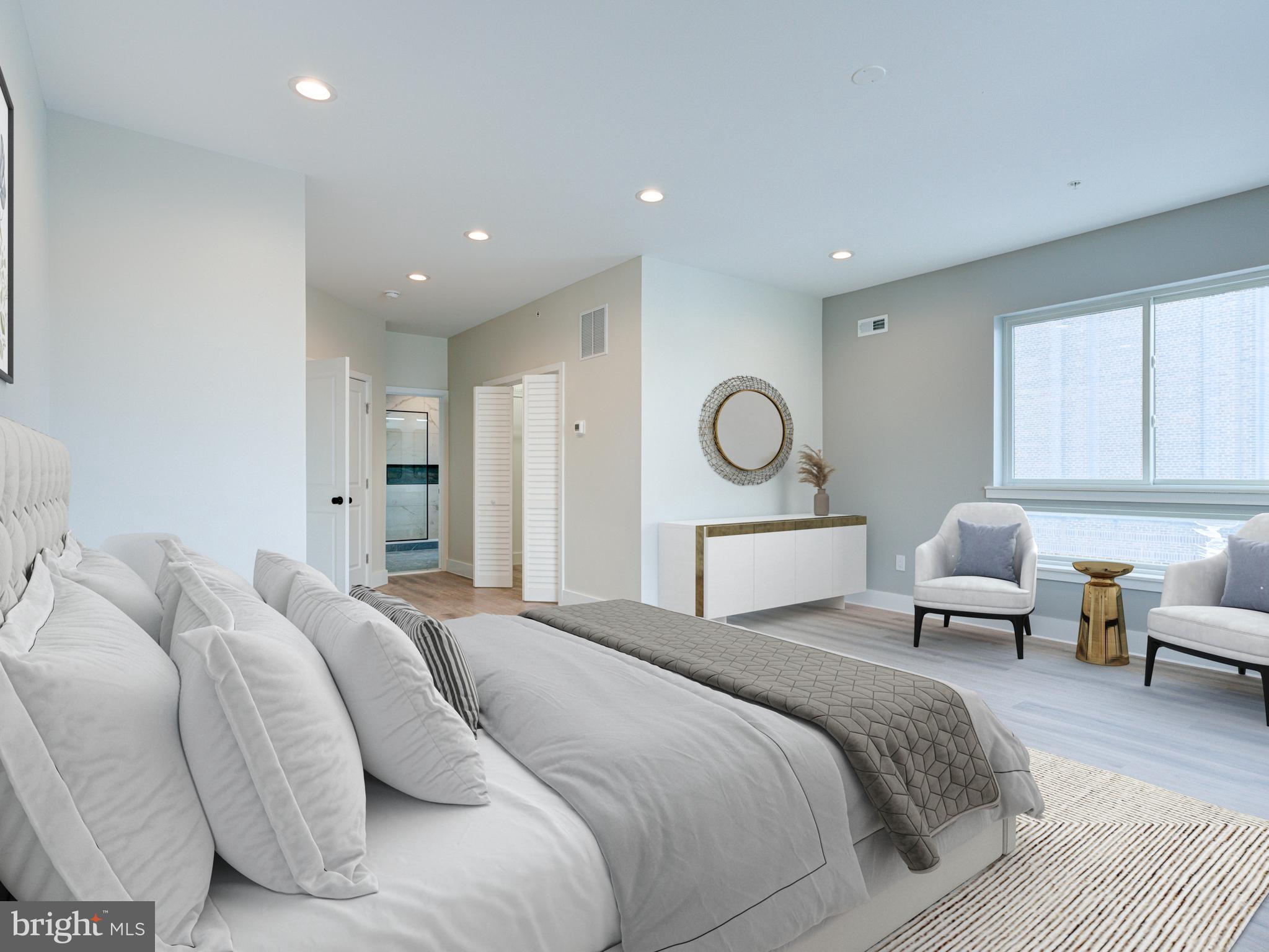 630 Moyer Street Philadelphia, PA 19125 - Photo 7 of 41 a bedroom with furniture and a large window