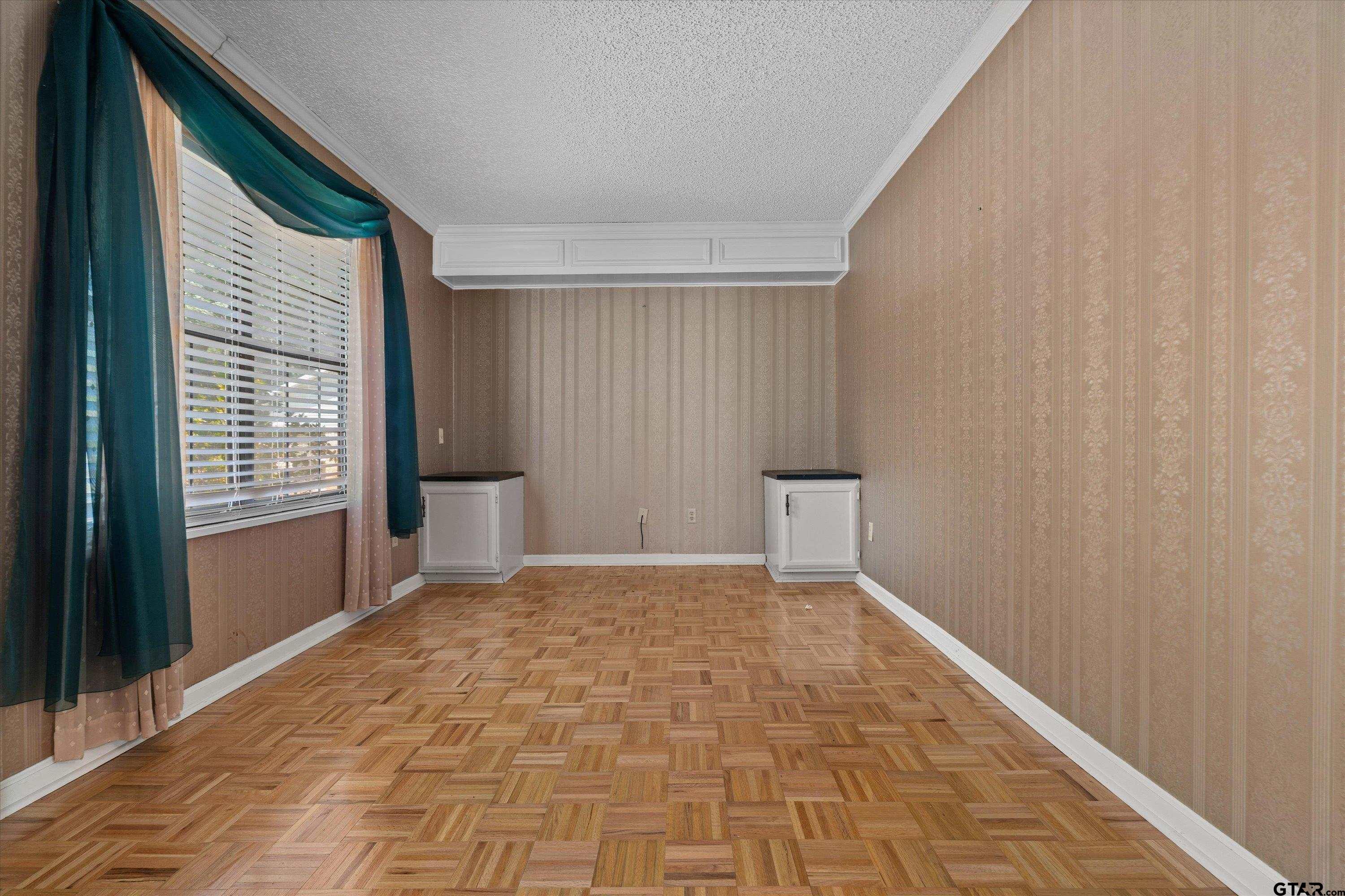 5820 Foxcroft Road Tyler, TX 75703 - Photo 5 of 39 This was used as a music room with organ and grand piano-could be formal LR or office