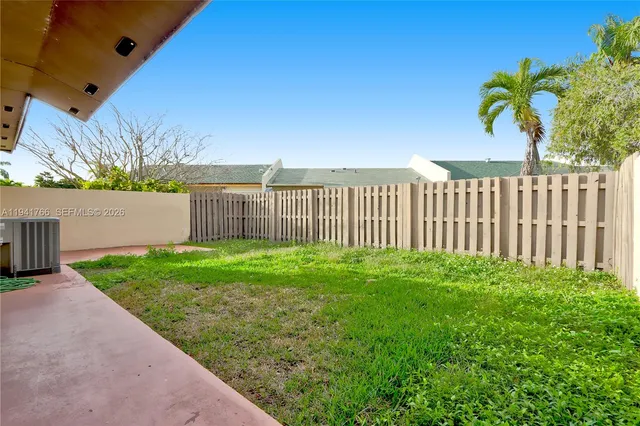 a view of a backyard with a garden