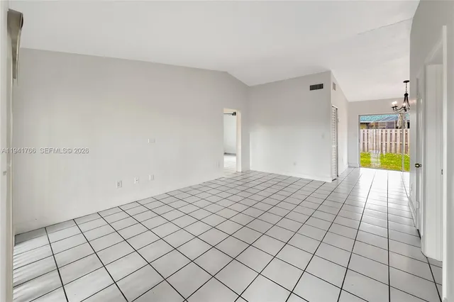 a view of an empty room and window