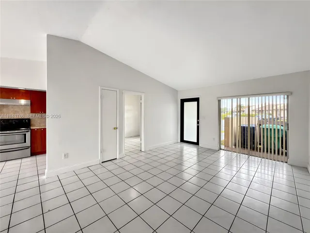 a view of a livingroom with wooden floor