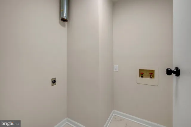 a view of a hallway with a shower
