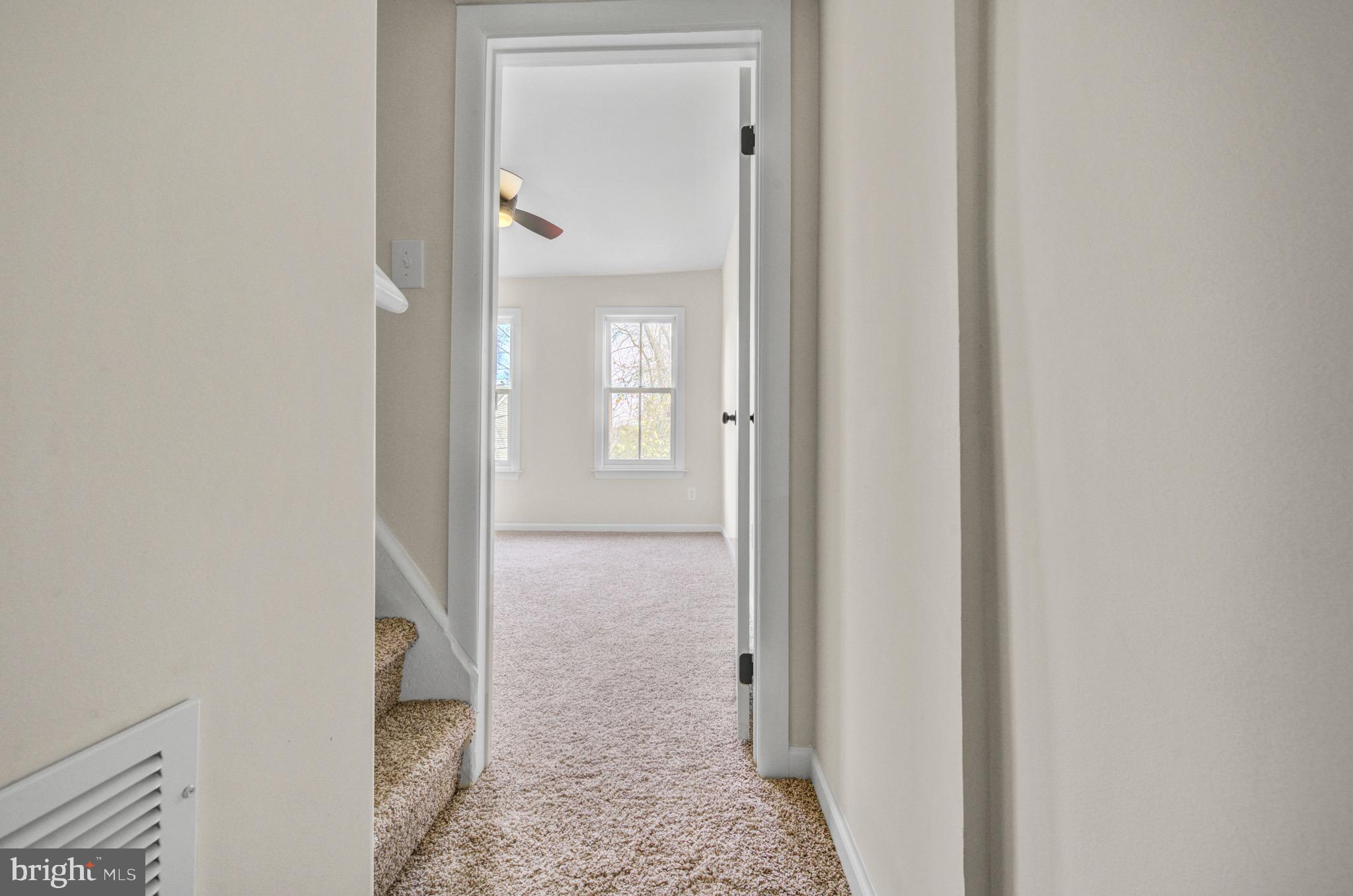 207 Jackson Street Trenton, NJ 08611 - Photo 22 of 37 a view of a bathroom from a hallway