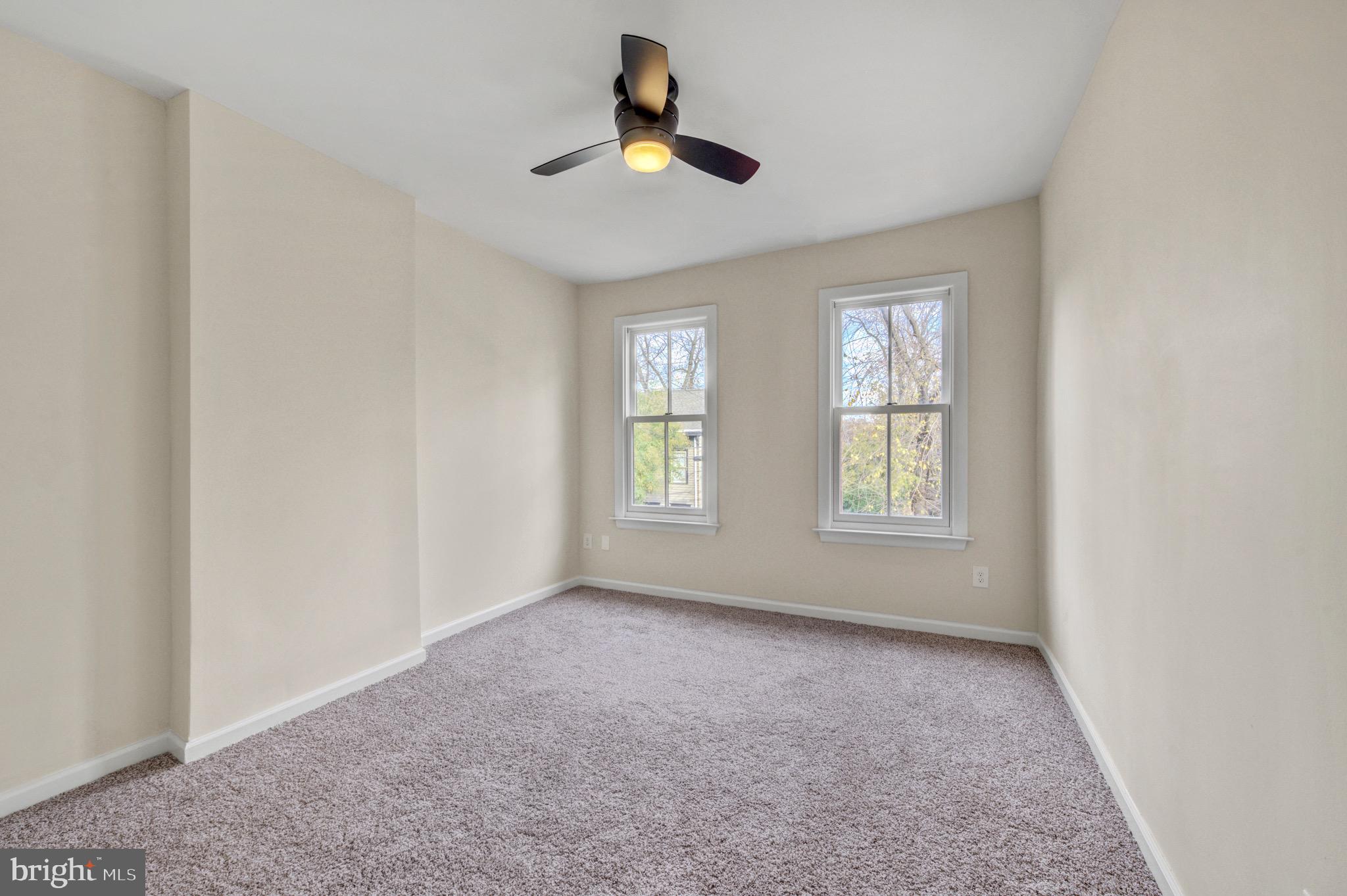 207 Jackson Street Trenton, NJ 08611 - Photo 23 of 37 a view of an empty room with windows
