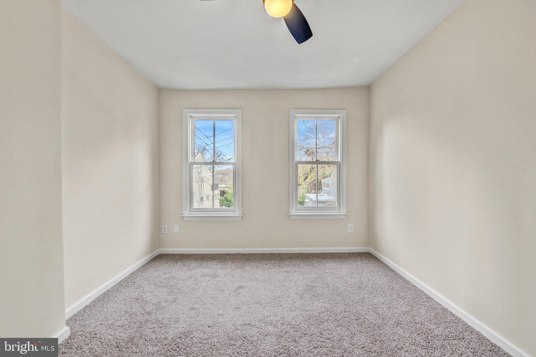 207 Jackson Street Trenton, NJ 08611 - Photo 24 of 37 an empty room with windows