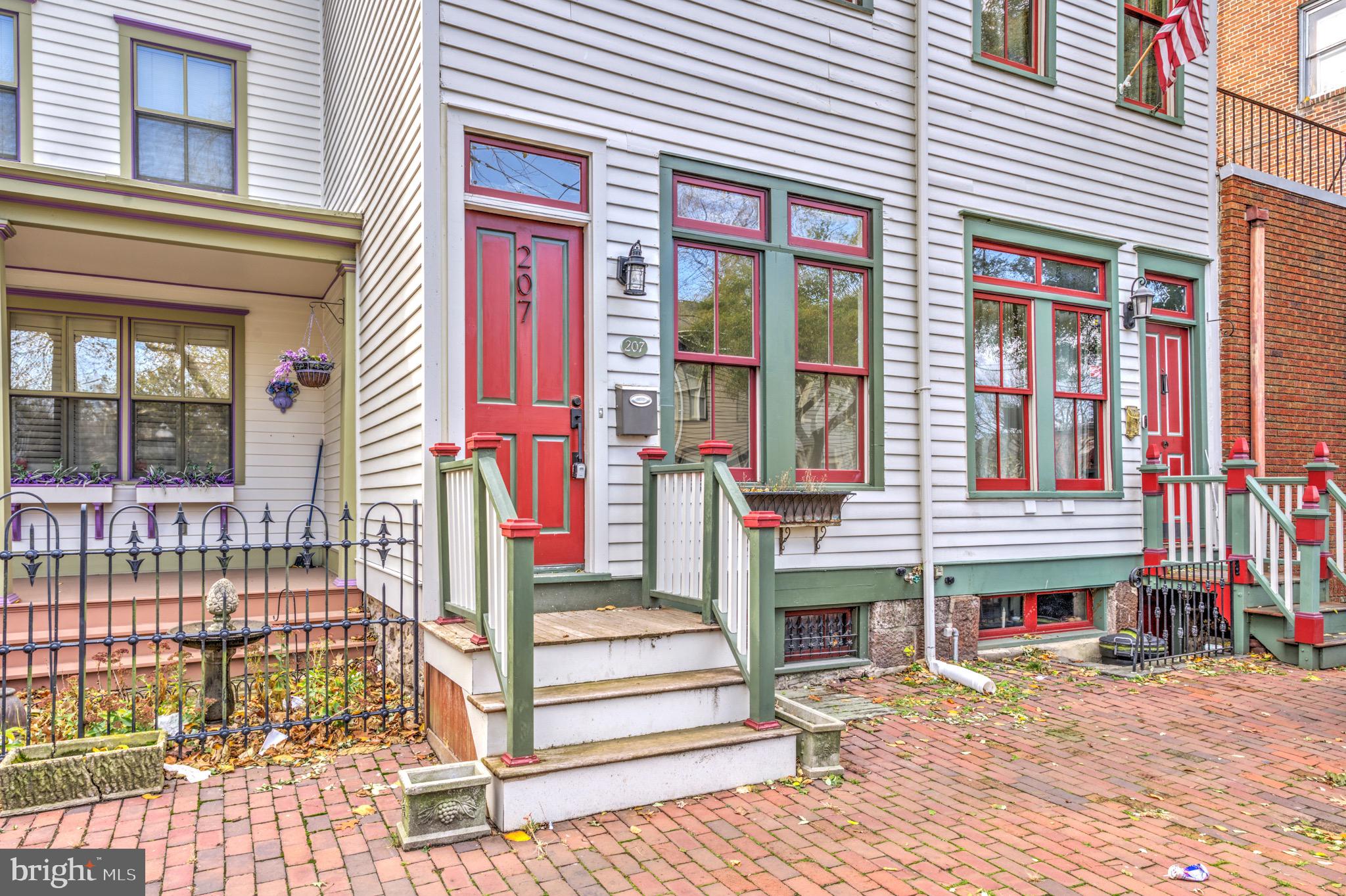 207 Jackson Street Trenton, NJ 08611 - Photo 35 of 37 a front view of a house with a porch