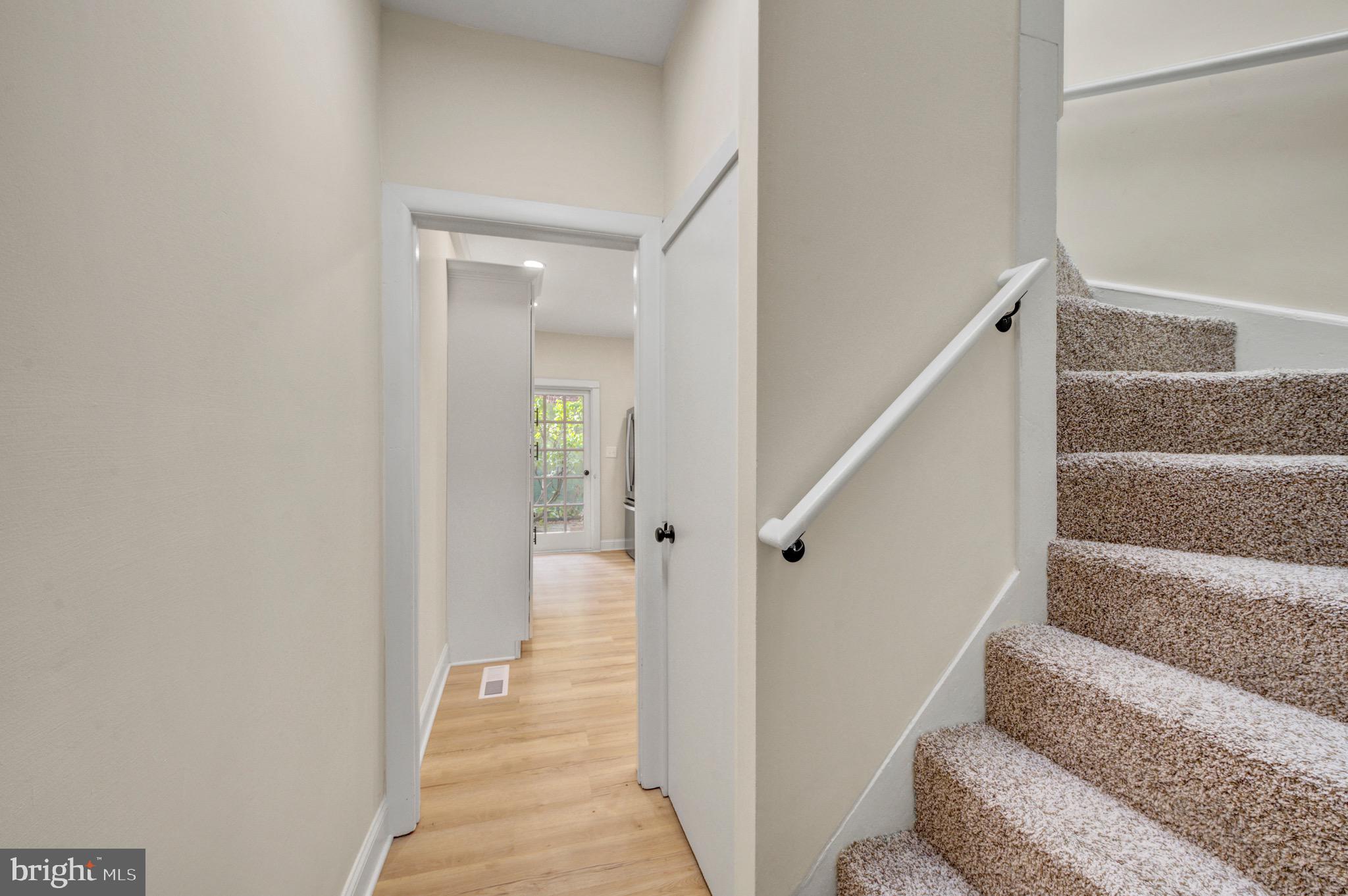 207 Jackson Street Trenton, NJ 08611 - Photo 9 of 37 a view of a hallway with wooden floor and entryway