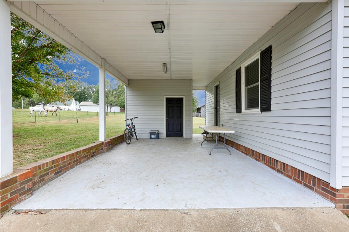 954 Veto Road Prospect, TN 38477 - Photo 3 of 23 a view of an house with backyard and garden