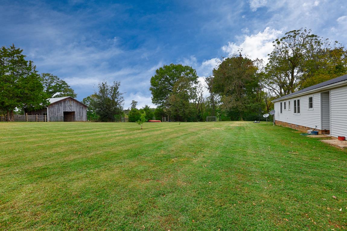 954 Veto Road Prospect, TN 38477 - Photo 23 of 23 a view of a house with a yard