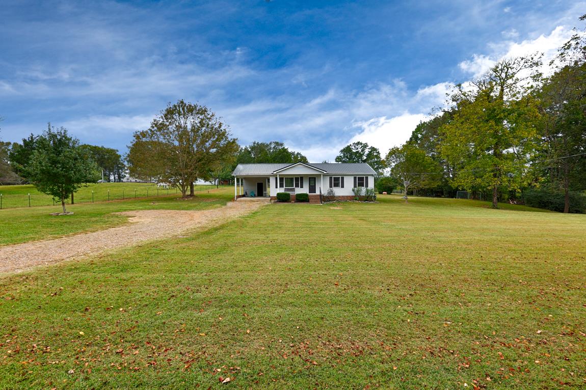 954 Veto Road Prospect, TN 38477 - Photo 5 of 23 a view of a house with a big yard