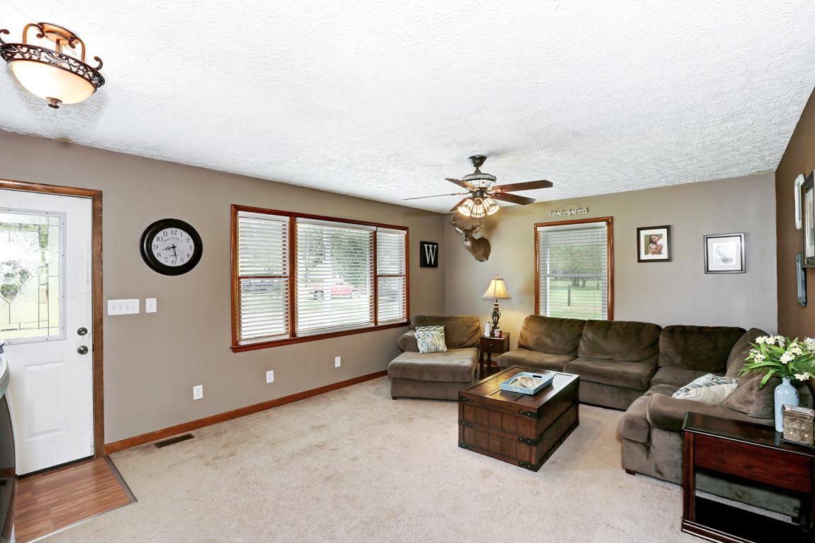 954 Veto Road Prospect, TN 38477 - Photo 8 of 23 a living room with furniture and a large window