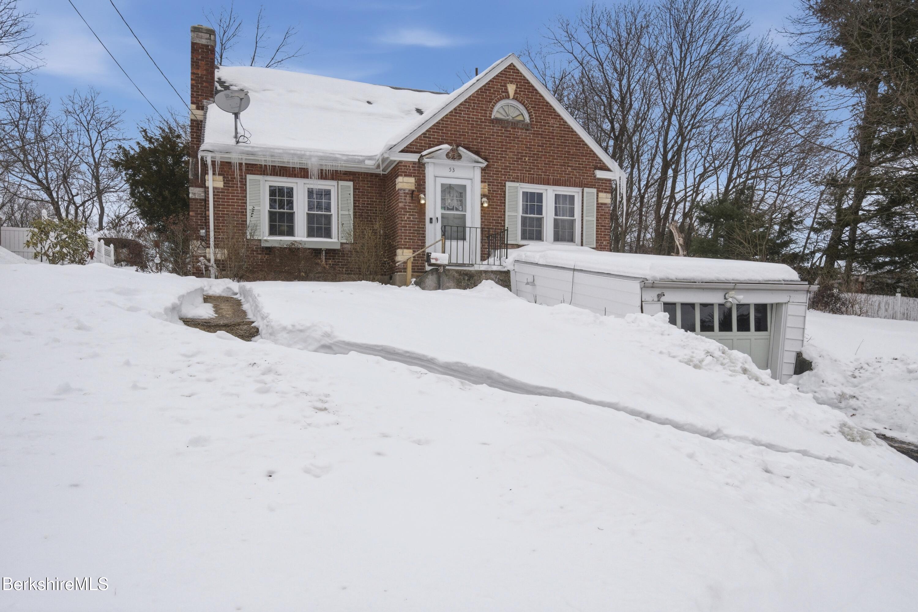 53 Edison Avenue Pittsfield, MA 01201 - Photo 39 of 45 a view of house with yard and snow in the background