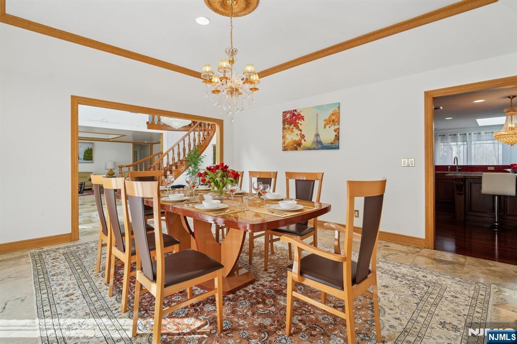 91 Chestnut Ridge Road Saddle River, NJ 07458 - Photo 11 of 50 a view of a dining room with furniture