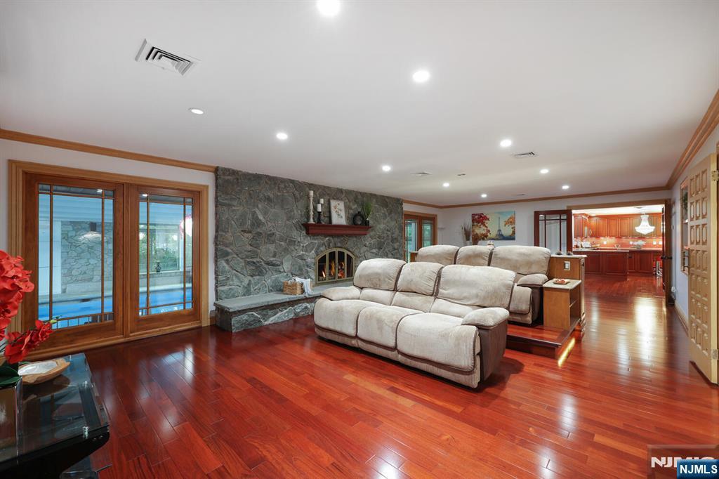 91 Chestnut Ridge Road Saddle River, NJ 07458 - Photo 12 of 50 a living room with furniture and a wooden floor