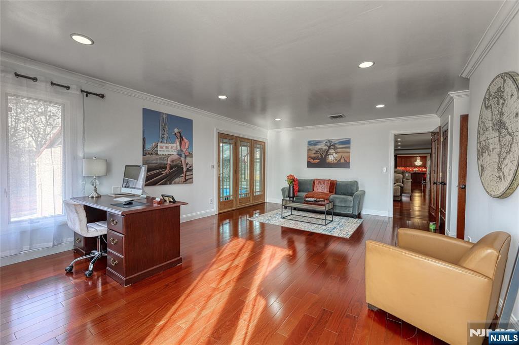 91 Chestnut Ridge Road Saddle River, NJ 07458 - Photo 18 of 50 a living room with furniture and a wooden floor