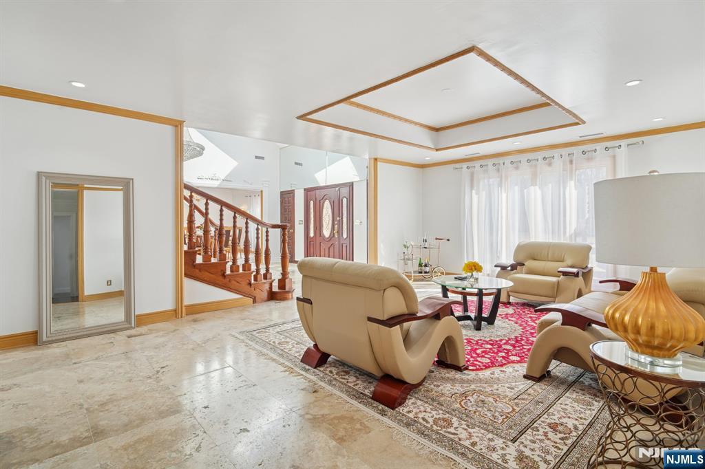 91 Chestnut Ridge Road Saddle River, NJ 07458 - Photo 9 of 50 a living room with furniture and a window