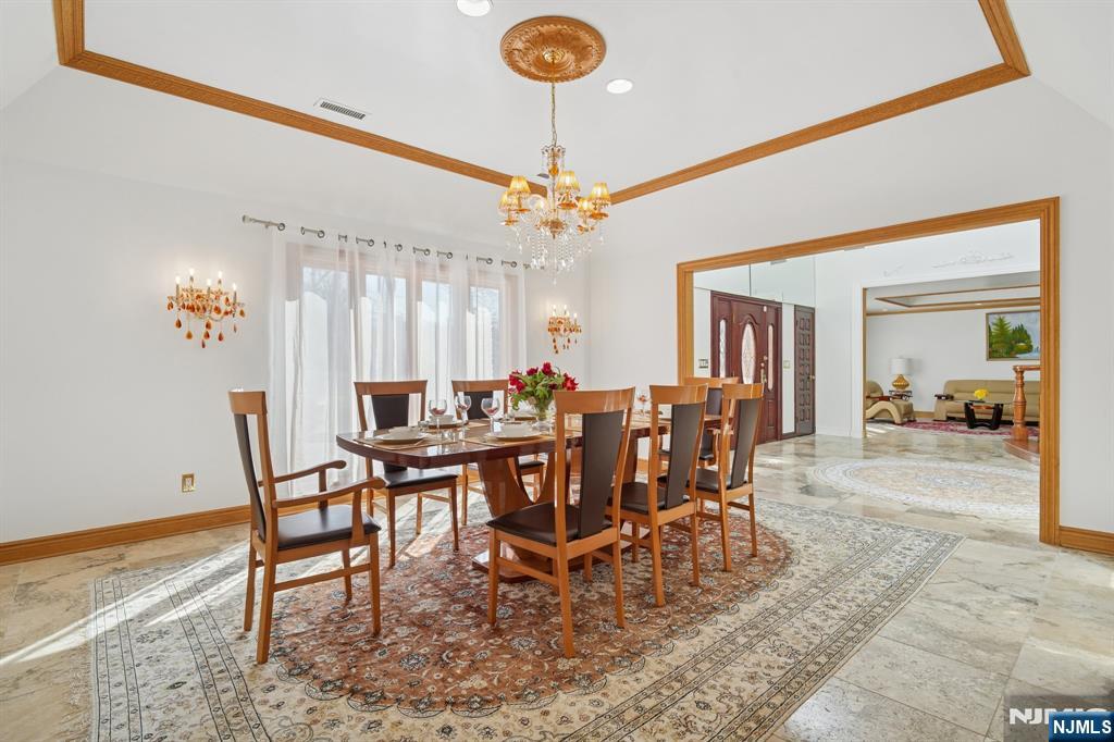 91 Chestnut Ridge Road Saddle River, NJ 07458 - Photo 10 of 50 a view of a dining room and livingroom view
