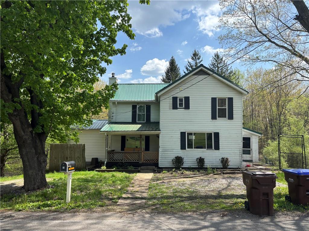 a front view of a house with garage