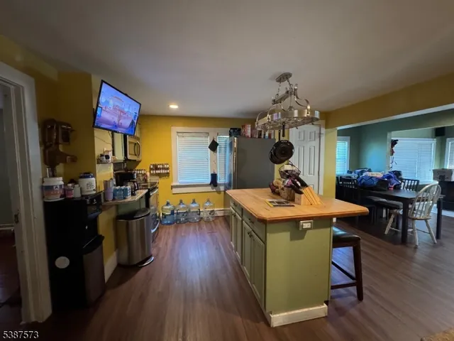 a view of a living room and dining room