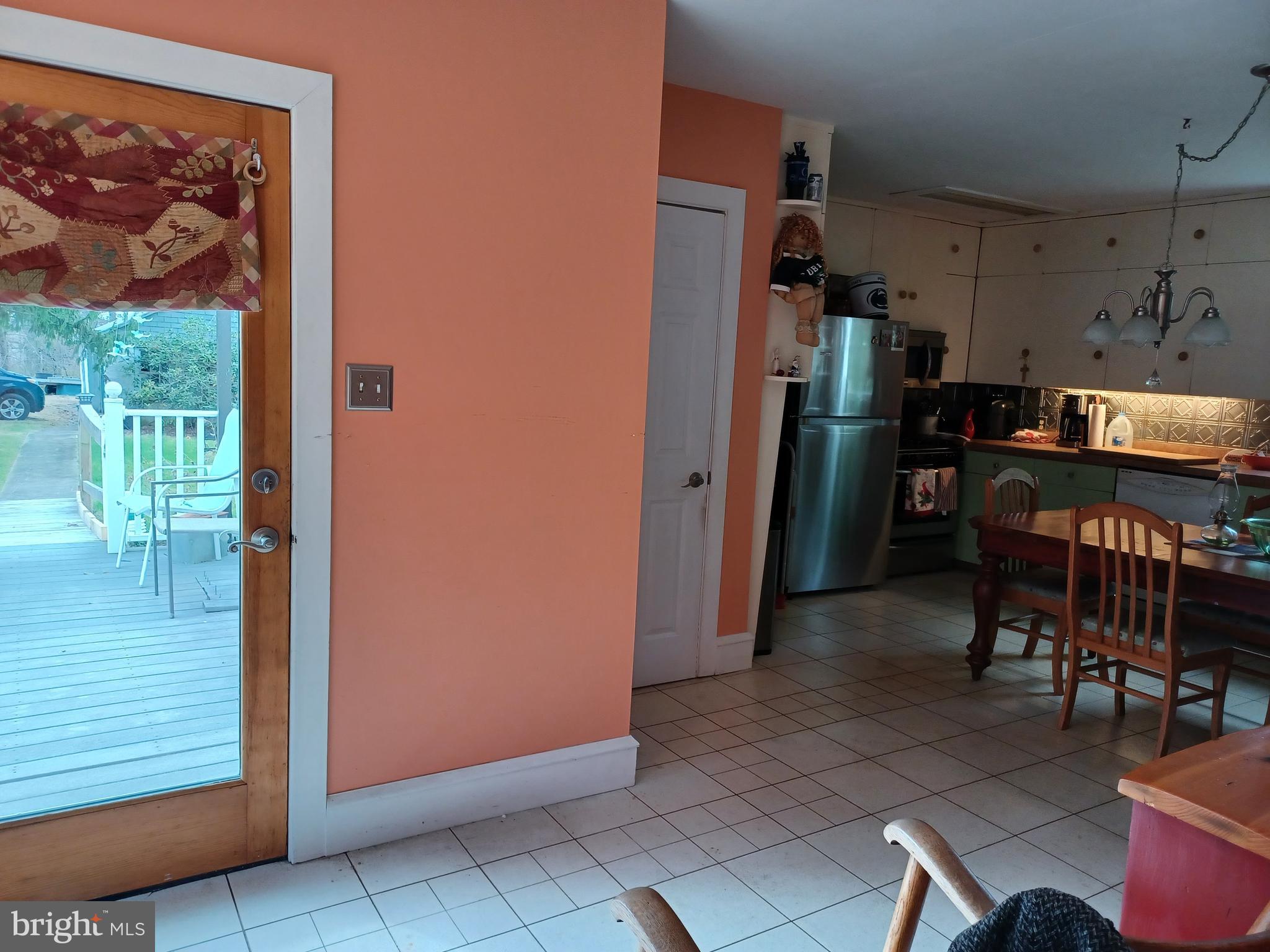 174 Niantic Road Barto, PA 19504 - Photo 5 of 35 Entry from deck to sunroom, half bath then kitchen