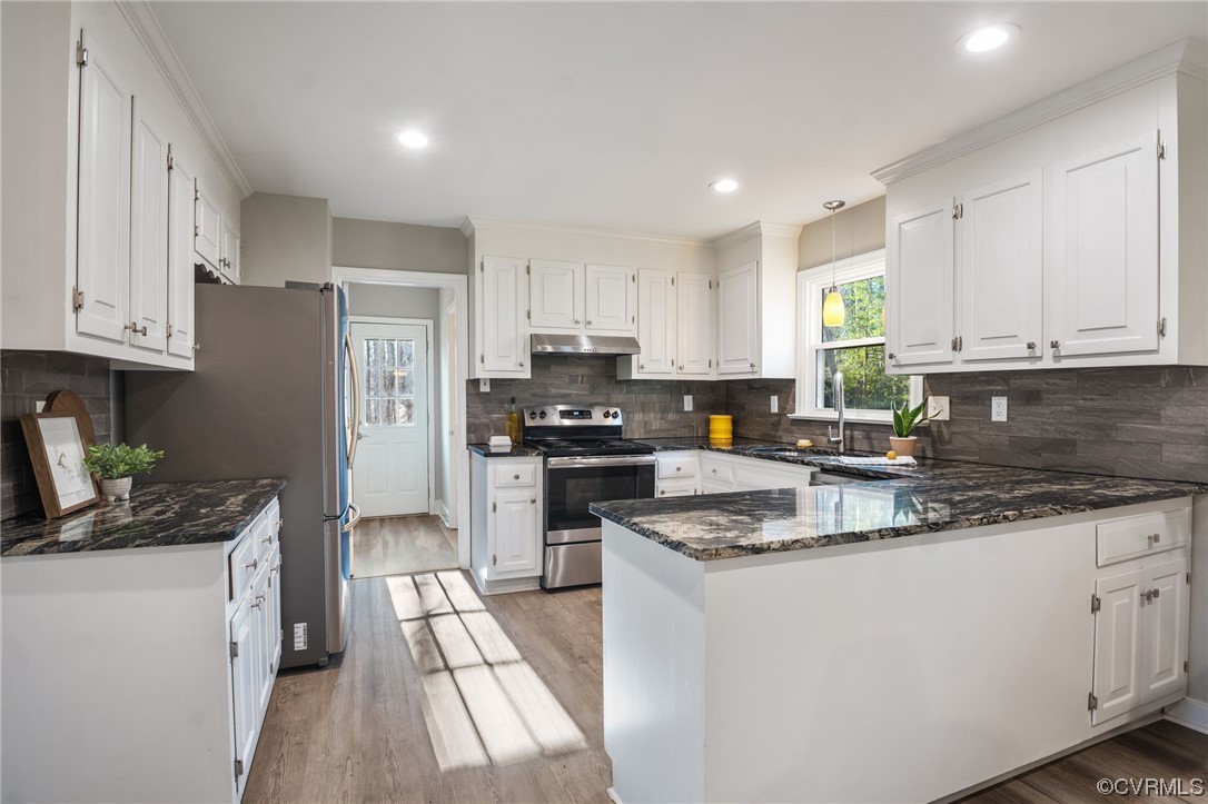 3200 Fox Chase Road Midlothian, VA 23112 - Photo 12 of 41 a kitchen with granite countertop a stove sink and cabinets