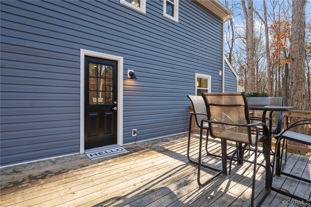 3200 Fox Chase Road Midlothian, VA 23112 - Photo 34 of 41 a patio with table and chairs and potted plants