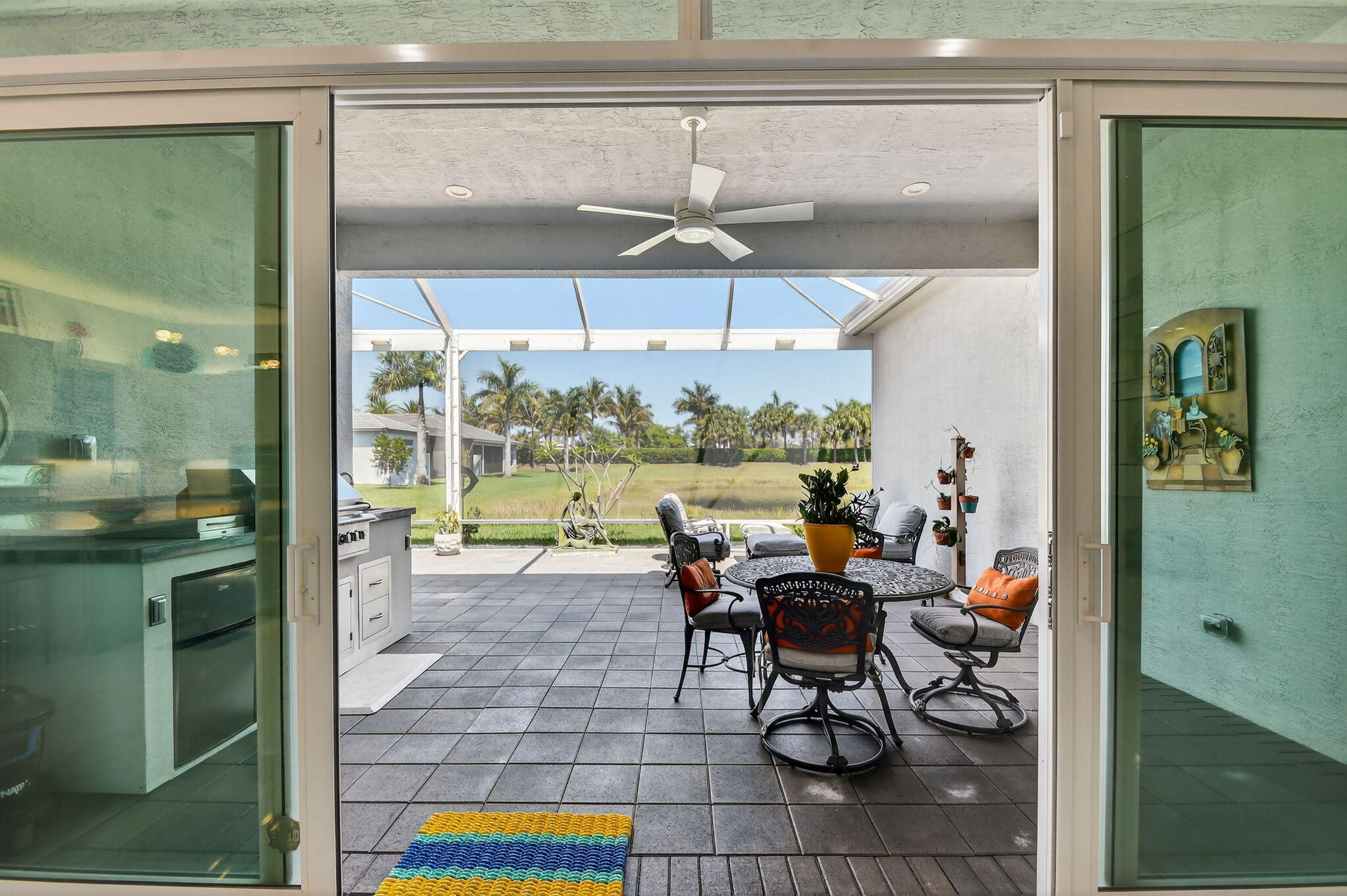 9193 Seahorse Bay Drive Boynton Beach, FL 33473 - Photo 27 of 70 View to Screened Patio