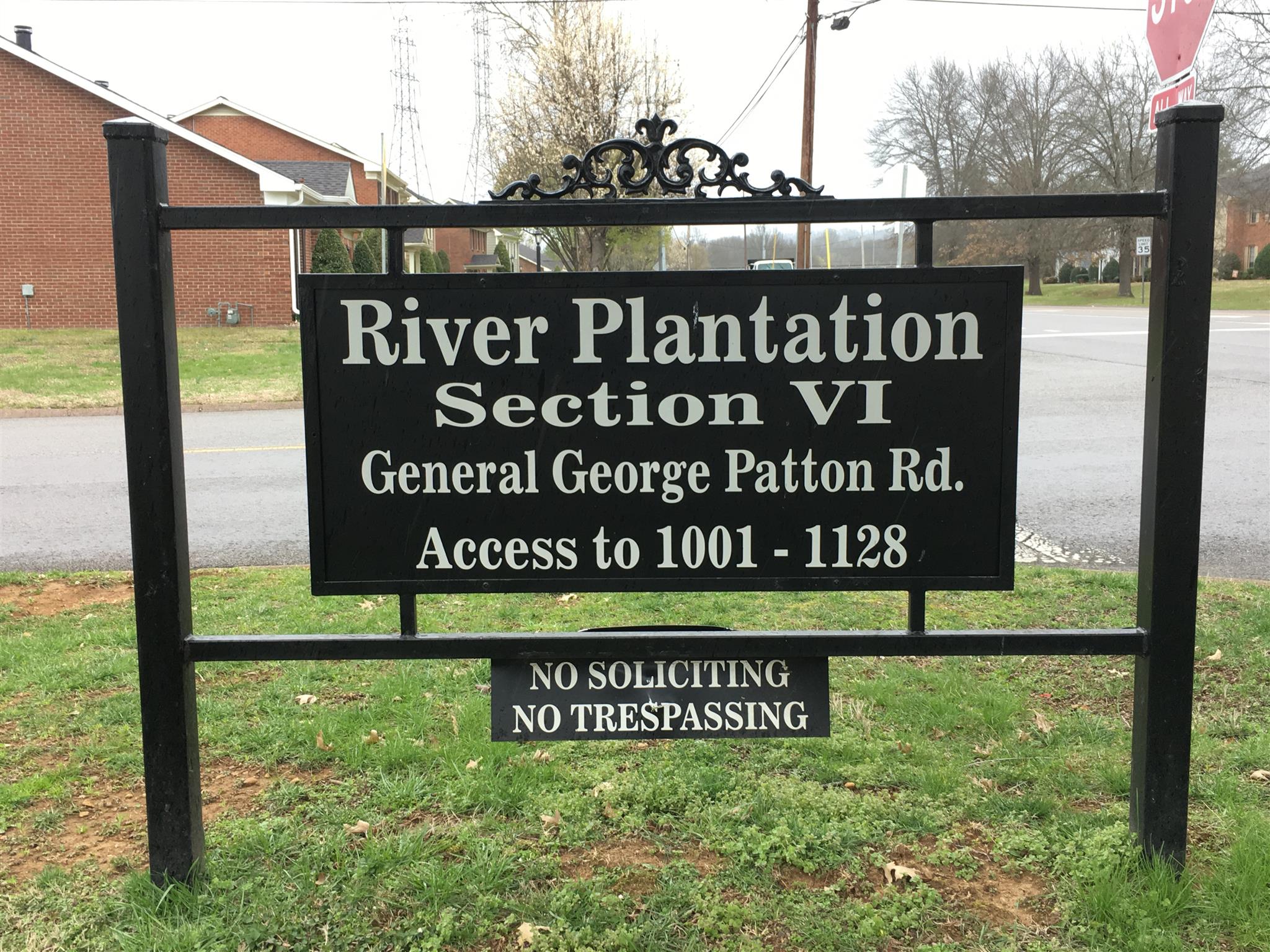 1128 General George Patton Road, Unit 1128 Nashville, TN 37221 - Photo 3 of 26 a view of outdoor space with a garden and signage