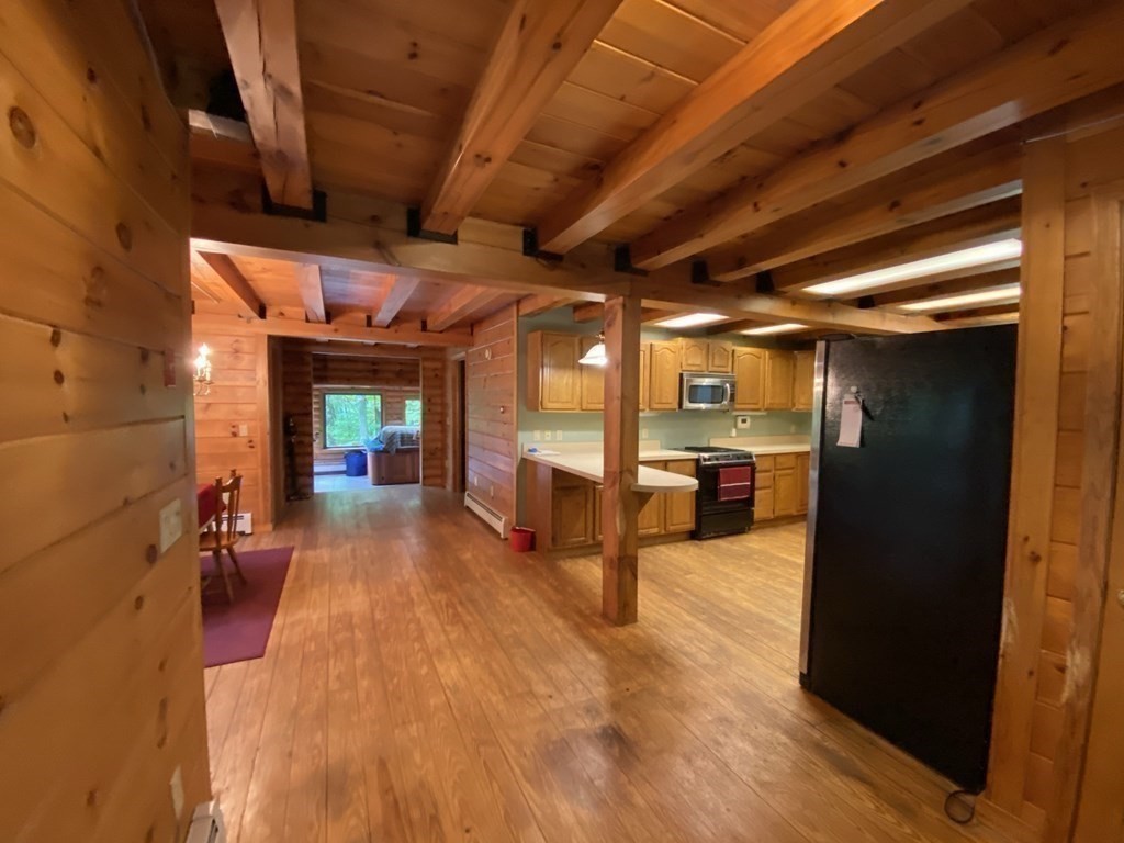 2089 Greenwich Road Hardwick, MA 01082 - Photo 13 of 38 a view of a hallway with a wooden floors