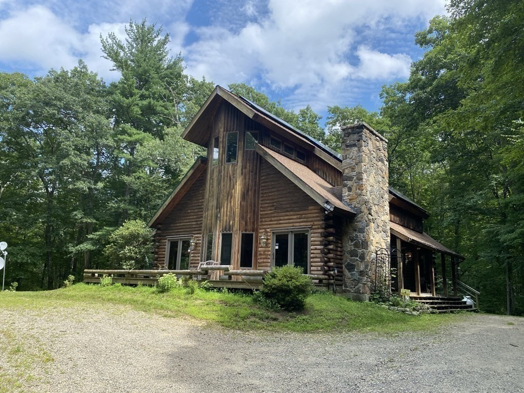 2089 Greenwich Road Hardwick, MA 01082 - Photo 2 of 38 a front view of house with yard and green space