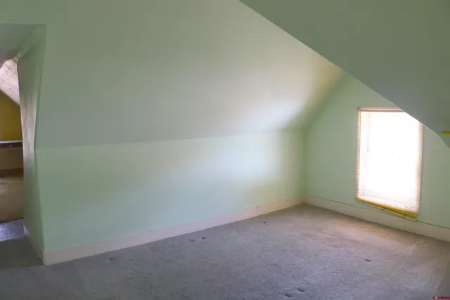 a view of a workspace with furniture