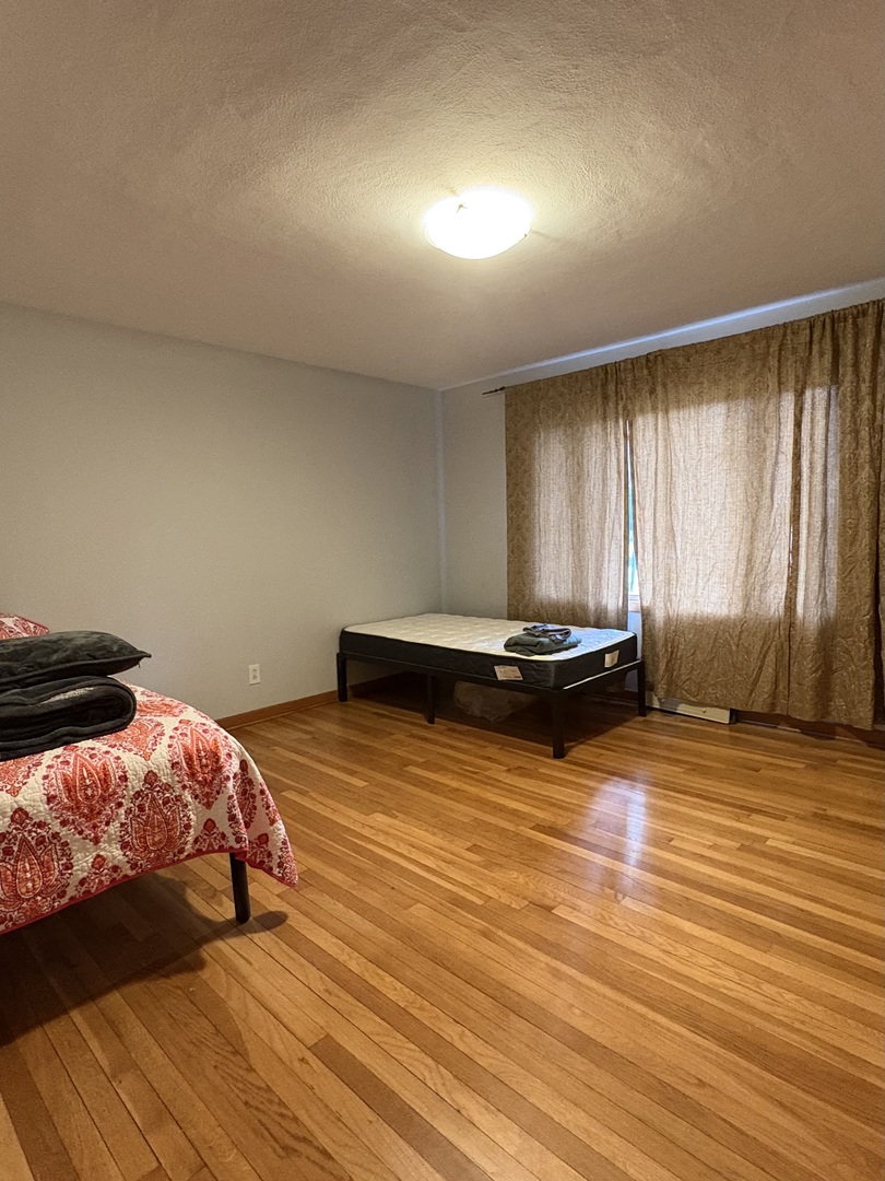 260 North St Marys Road Libertyville, IL 60048 - Photo 8 of 15 a bedroom with a bed and window