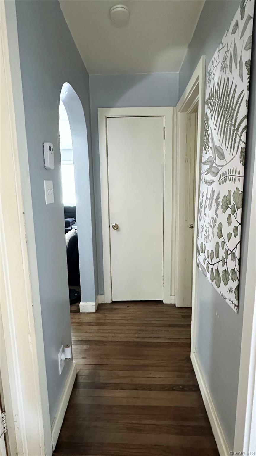 9 Hope Street Liberty, NY 12754 - Photo 11 of 24 a view of entryway with wooden floor and stairs